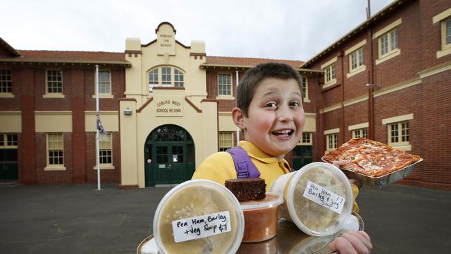 Flat chat families are turning to the school canteen for their nightly feed. Several Melbourne schools are offering take-home dinners so busy parents can spend more quality time with kids. Mum Rita Gattoni, whose son Zac is at Coburg West Primary School, said the meals were as good as home made. Picture: David Caird.