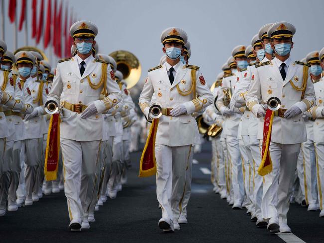 A Chinese military band arrives for celebrations in Beijing on July 1, 2021, to mark the 100th anniversary of the founding of the Communist Party of China. (Photo by WANG Zhao / AFP)