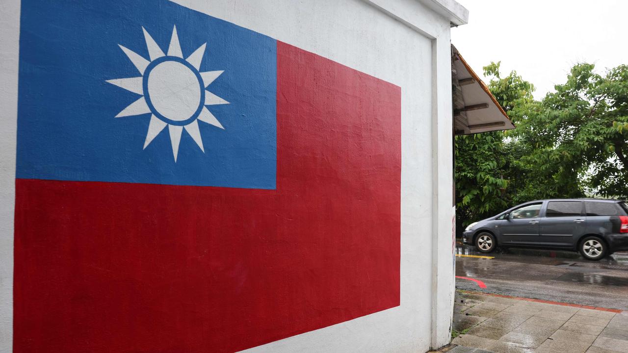 A painting of Taiwan's national flags is seen at Lieyu township in Kinmen on May 23,2024. (Photo by I-Hwa CHENG / AFP)