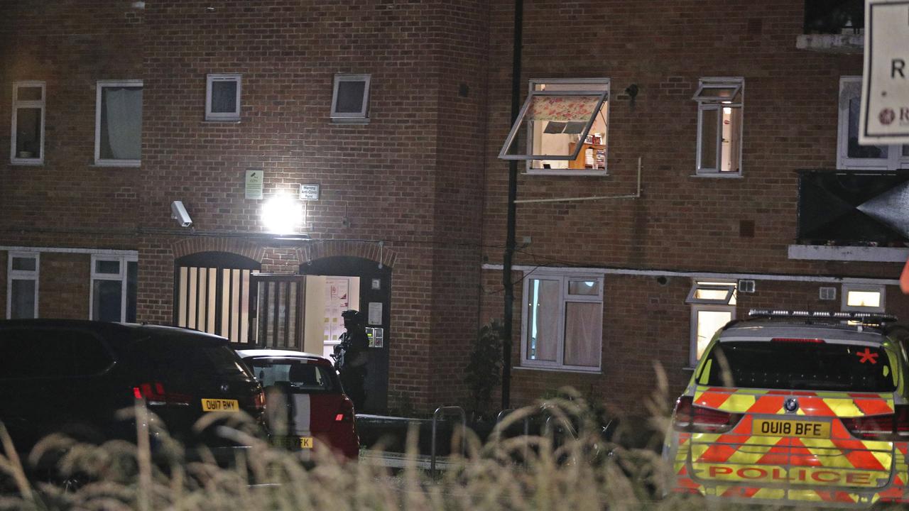 Police entered a block of flats in Reading. British media said police were treating the attack as terrorism related. Picture: Steve Parsons/PA via AP.