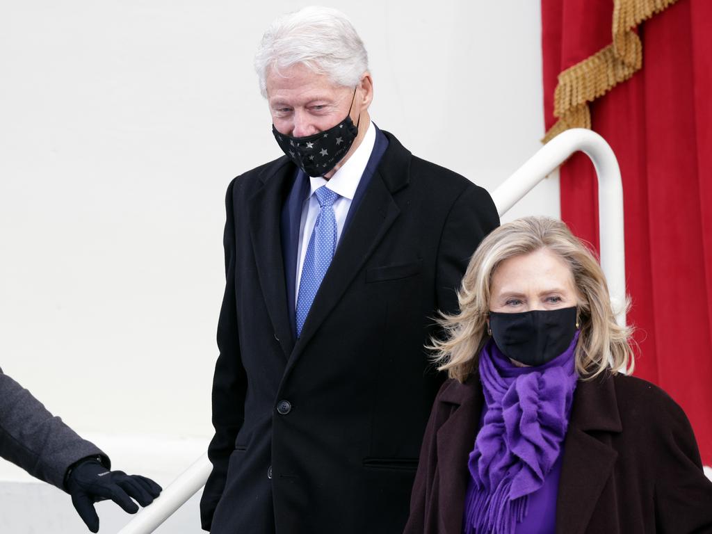 Former US President Bill Clinton arrives with former Secretary of State Hillary Clinton to the inauguration of Joe Biden. Picture: Getty Images