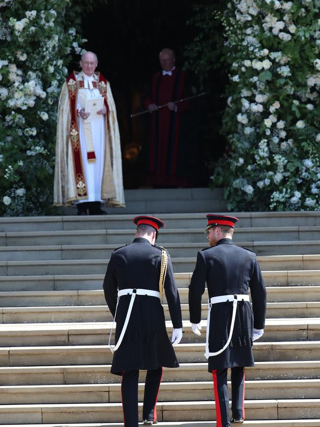 Prince Harry and Prince William enter the chapel. Picture: AFP