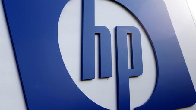 FILE - This Feb. 21, 2012 file photo shows a Hewlett Packard logo in Frisco, Texas. Hewlett-Packard said Wednesday, May 23, 2012 that it's laying off 27,000 workers, 8 percent of its work force, as it restructures the business. The Palo Alto, Calif., company said it'll save $3 billion to $3.5 billion annually from cost cuts, including the layoffs. Hewlett-Packard Co. expects to complete the job cuts by the end of fiscal 2014. (AP Photo/LM Otero, File)