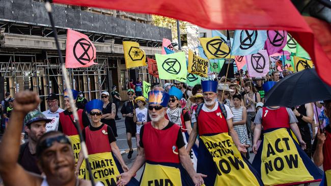 The activists march towards Flinders Street Station Picture: NCA NewsWire / Diego Fedele