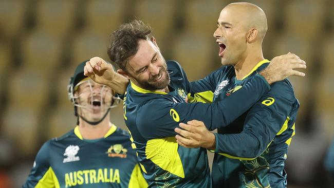 GROS ISLET, SAINT LUCIA - JUNE 15: Ashton Agar of Australia celebrates with teammate Glenn Maxwell after bowling Michael Jones of Scotland (not pictured) during the ICC Men's T20 Cricket World Cup West Indies & USA 2024 match between Australia and Scotland at  Daren Sammy National Cricket Stadium on June 15, 2024 in Gros Islet, Saint Lucia. (Photo by Robert Cianflone/Getty Images)