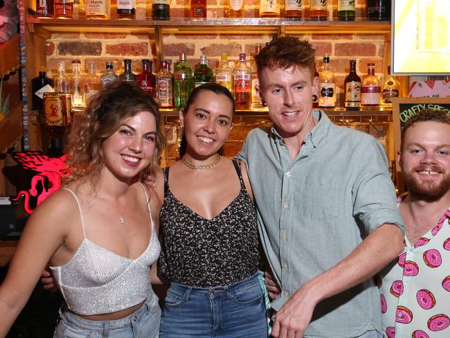 Nikki Millman, Olivia Walker, Ben Power and Jake Parba celebrated New Year's Eve at The Courtyard on the Cairns Esplanade. Picture: Brendan Radke
