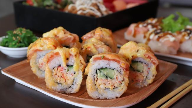 Sunshine Sushi’s crab salad and cucumber topped with melted cheese. Picture: Jenifer Jagielski