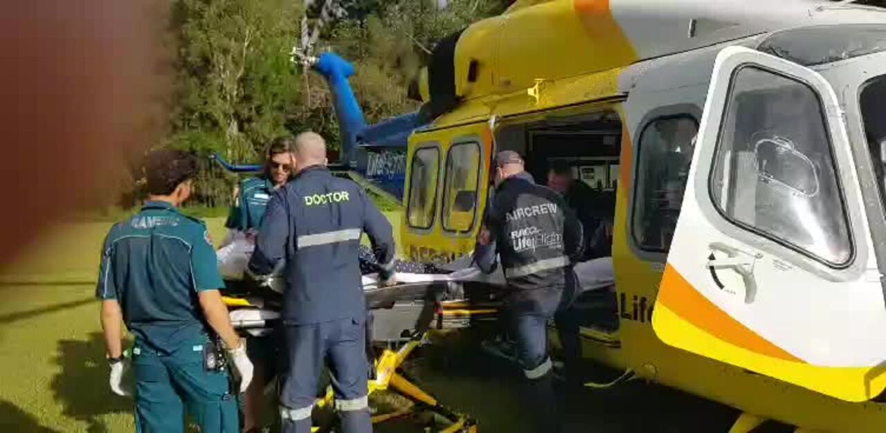 Kaye Scoble gets flown from Macleay Island after a bumpy ride in an ambulance over an unkempt council easement to the island's helipad.