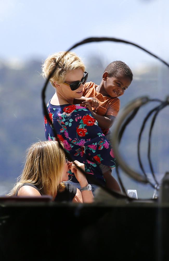 Charlize Theron having lunch at Catalina's, Rose Bay with her son, Jackson in 2013. Picture: Bradley Hunter