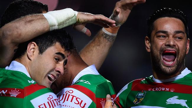 TOWNSVILLE, AUSTRALIA - AUGUST 13: Greg Inglis of the Rabbitohs celebrates after scoring a try during the round 23 NRL match between the North Queensland Cowboys and the South Sydney Rabbitohs at 1300SMILES Stadium on August 13, 2015 in Townsville, Australia. (Photo by Ian Hitchcock/Getty Images)