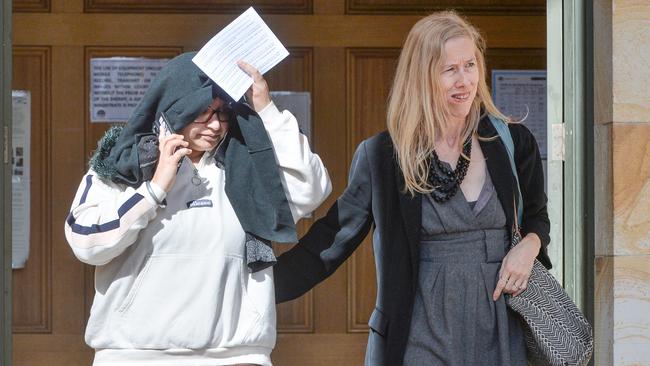 Harpreet Kaur, left, leaves the Adelaide Magistrates Court with her lawyer. Picture: Brenton Edwards