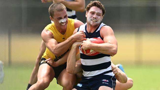 Jack Steven is tackled by Jack Ross in a Geelong-Richmond scratch match in October. Picture: Quinn Rooney/Getty Images