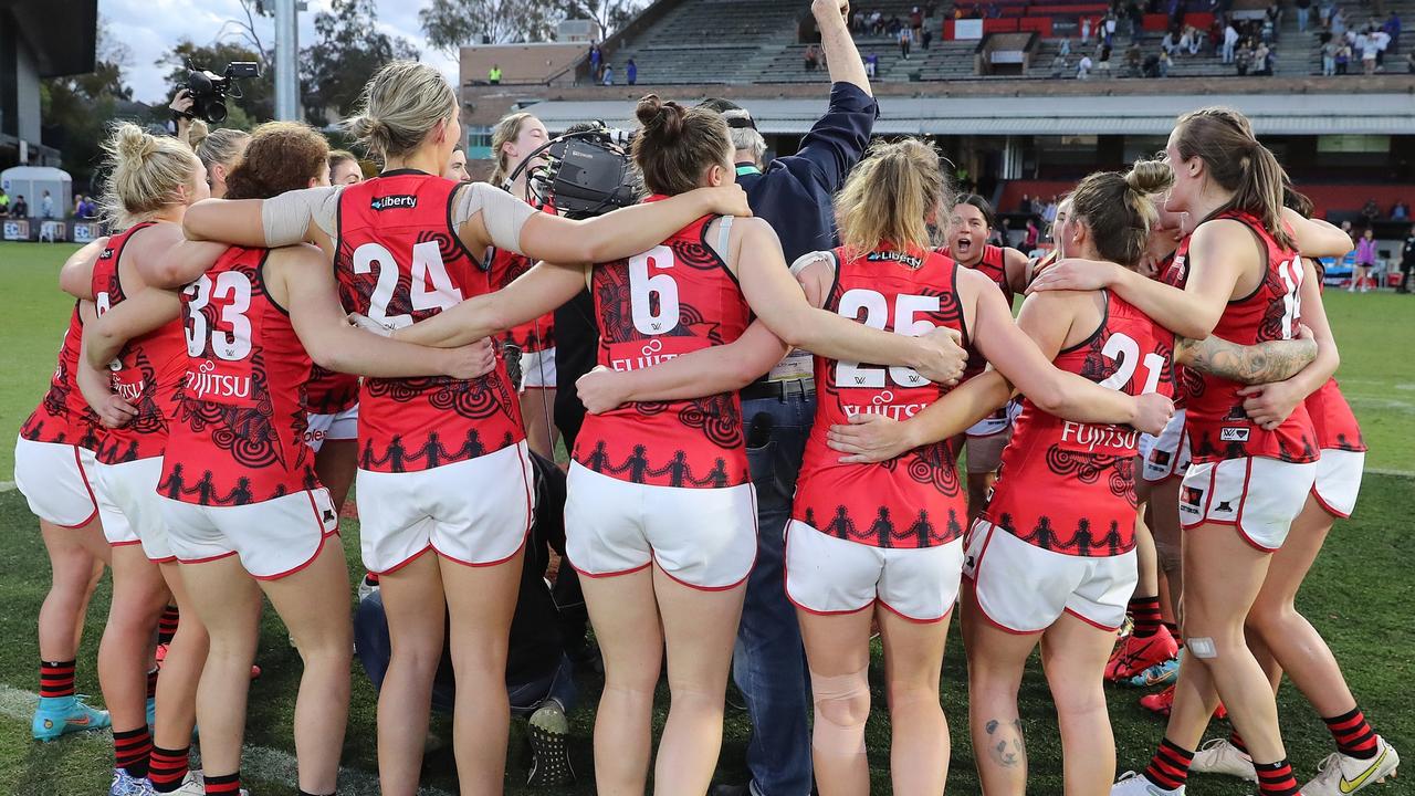 The Bombers sing the team song after their impressive win in Perth. Picture: Will Russell/AFL Photos via Getty Images