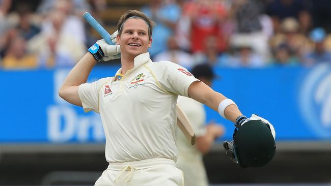 Australia's Steve Smith celebrates reaching his century during play on the fourth day of the first Ashes cricket Test match between England and Australia at Edgbaston.