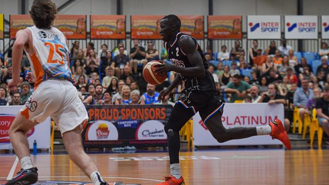 Makuach Maluach in action for the Darwin Salties against Cairns Marlins at the DBA stadium. Picture: Pema Pakhrin.