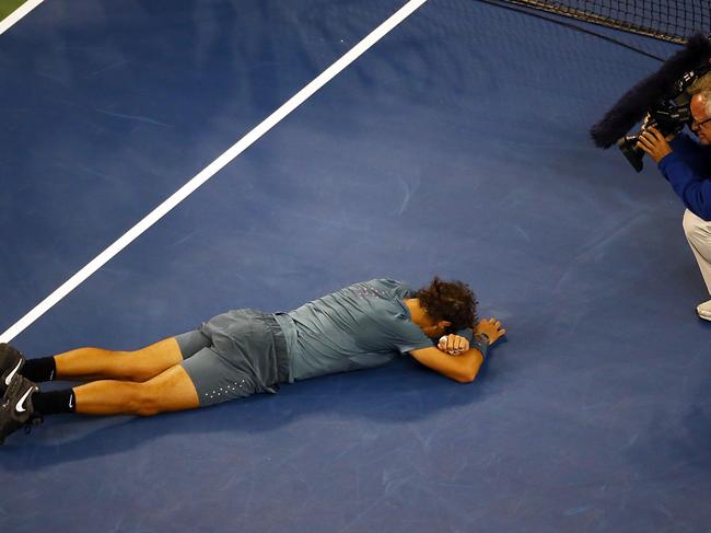 Nadal falling to the court at Flushing Meadows after a prolific 2013. Picture: Joe Scarnici/Getty Images