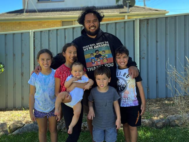 Savvy shopper Moris Luhi, of Newcastle, uses FlyBuys to save on grocery bills and goods for his children Arielle, 9, Willow, 10, Imani, 1, Darius, 4, and Elijah, 7. Picture: Supplied