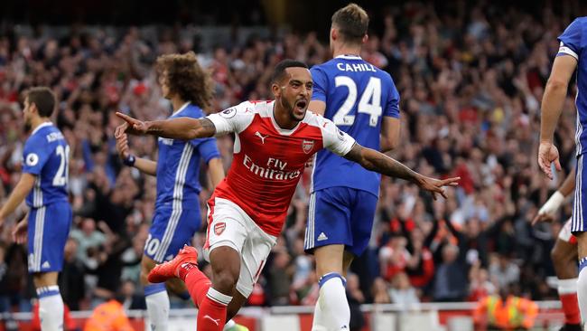 Arsenal's Theo Walcott celebrates after scoring his side's second goal