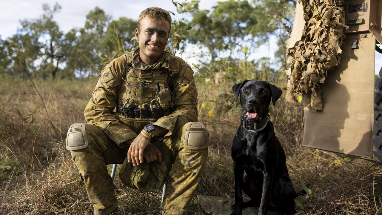 Australian Army soldier Sapper Flynn Skerke-Irwin and Explosive Detection Dog Ethan from 3rd Combat Engineer Regiment during Exercise Brolga Run 2024 in Townsville Field Training Area, Queensland.