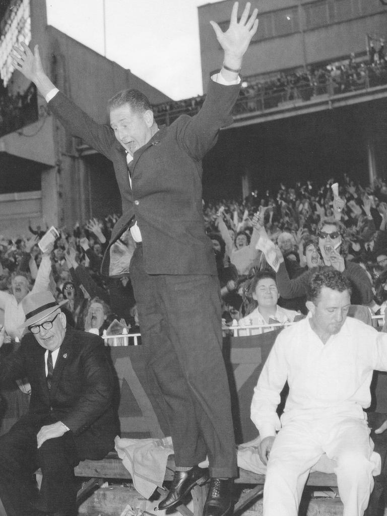 Melbourne coach Norm Smith jumps for joy on the final siren. Picture: Melbourne Football Club Collection