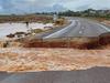 Roxby, Woomera cut off as rain records smashed