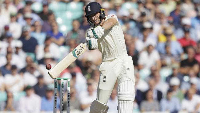 Jos Buttler hits out against Pat Cummins on day two. Picture: AP