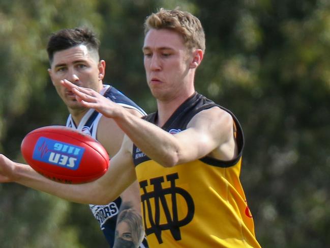 Oscar Junker sends Werribee Districts into attack in their WRFL elimination final against Hoppers Crossing. Picture: Cody Bench Photography