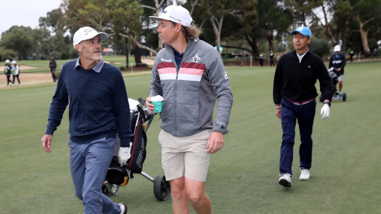 Advertiser competition winner Pieter de Wit teamed up with pro golfer Cameron Smith for nine holes. Picture: Dean Martin