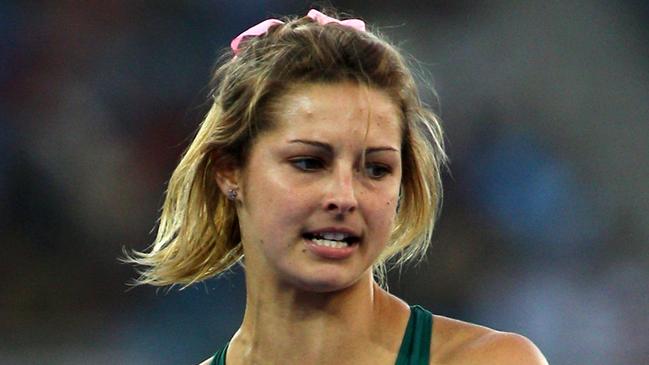 DELHI, INDIA - OCTOBER 12: Amanda Bisk of Australia reacts during the women's pole vault final at Jawaharlal Nehru Stadium during day nine of the Delhi 2010 Commonwealth Games on October 12, 2010 in Delhi, India. (Photo by Mark Dadswell/Getty Images)