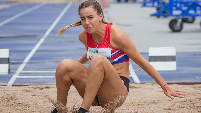 Delta Amidzovski from Albion Park went from the U17 long jump to the hurdles racing with barely a break.