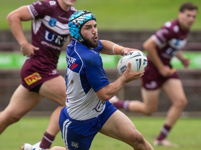 Bulldog Danny Ghantous looks to offload. Picture: Julian Andrews.