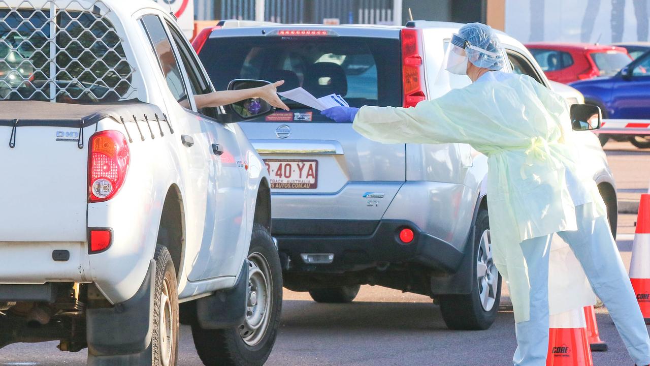 NT residents drive through a mass testing site at Marrara in Darwin after several new contact sites including the Buff Club on the Stuart Highway Picture: Glenn Campbell