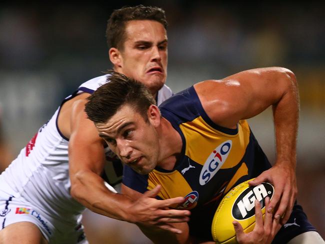 Harley Balic playing for the Dockers against Fremantle.