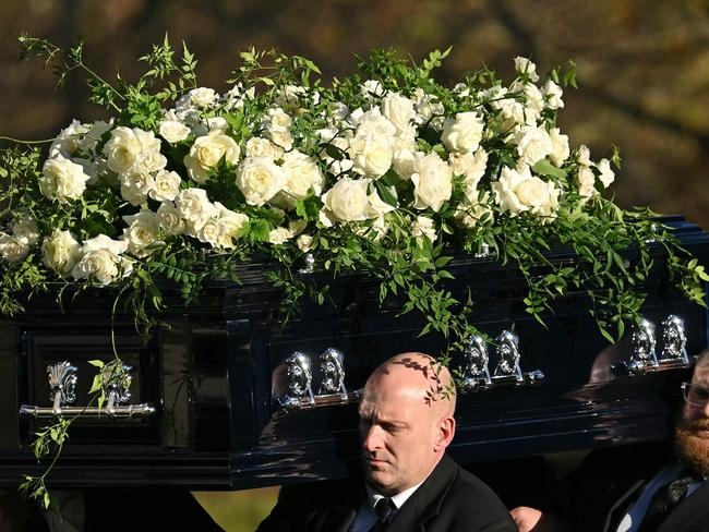 Pallbearers carry the coffin of late One Direction singer Liam Payne out of St Mary's church following his funeral service in Amersham, west of London. Picture: AFP