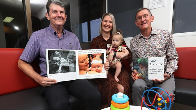 Paediatrician Dr Tim Warnock (left) expected to retire in July with new mum Renae Dallalba and obstetrician the late Dr Tom Wright (right). Picture: Stewart McLean