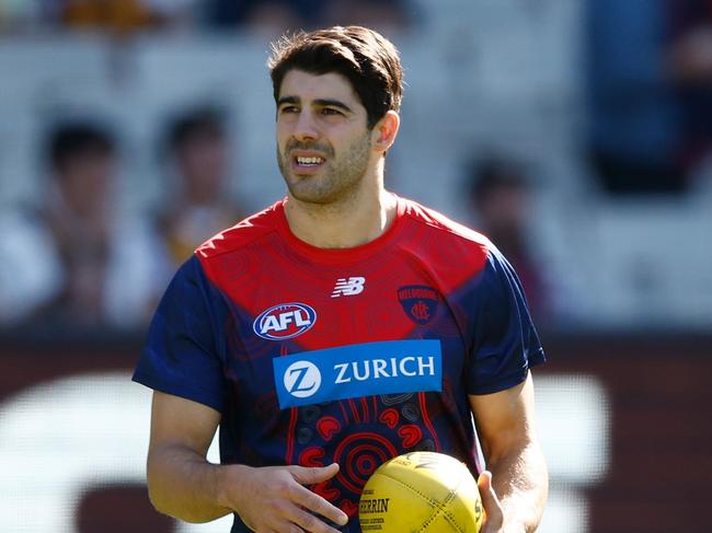 MELBOURNE, AUSTRALIA - MARCH 23: Christian Petracca of the Demons warms up during the 2024 AFL Round 02 match between the Hawthorn Hawks and the Melbourne Demons at the Melbourne Cricket Ground on March 23, 2024 in Melbourne, Australia. (Photo by Michael Willson/AFL Photos via Getty Images)