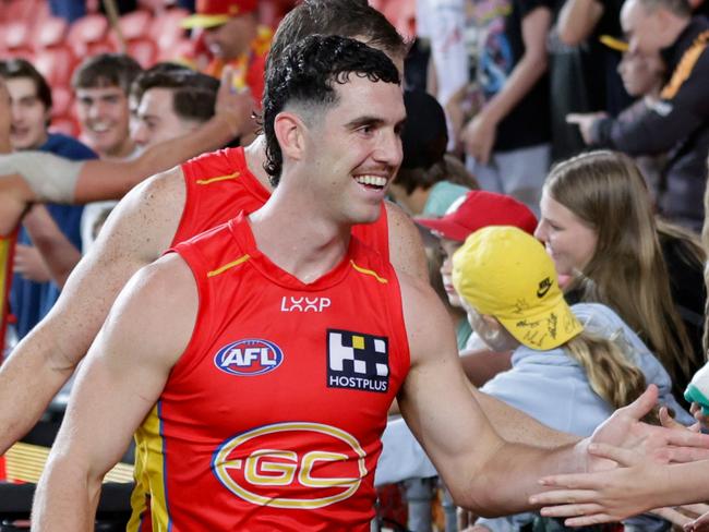 GOLD COAST, AUSTRALIA - APRIL 13: Sam Flanders of the Suns interacts with fans following the 2024 AFL Round 05 match between the Gold Coast SUNS and the Hawthorn Hawks at People First Stadium on April 13, 2024 in Gold Coast, Australia. (Photo by Russell Freeman/AFL Photos via Getty Images)