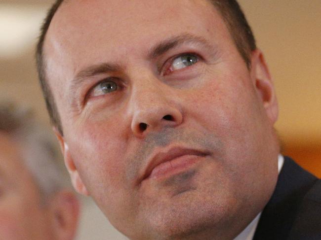 Treasurer Josh Frydenberg (centre) looks on as Prime Minister Scott Morrison delivers 2019 Sir Robert Menzies Lecture in Melbourne, Australia, Tuesday, March 12, 2019. (AAP Image/Daniel Pockett) NO ARCHIVING