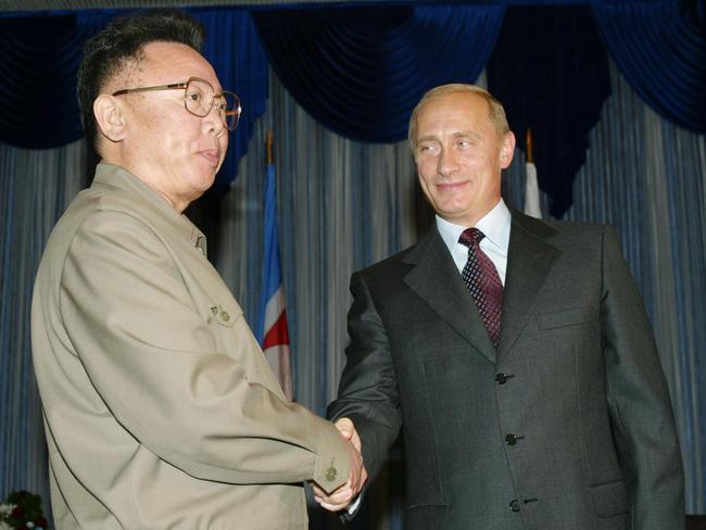 Russian President Vladimir Putin shakes hands with former North Korean leader Kim Jong Il during a meeting in Vladivostok, 2002. Picture: AFP Photo/Alexander Nemenov