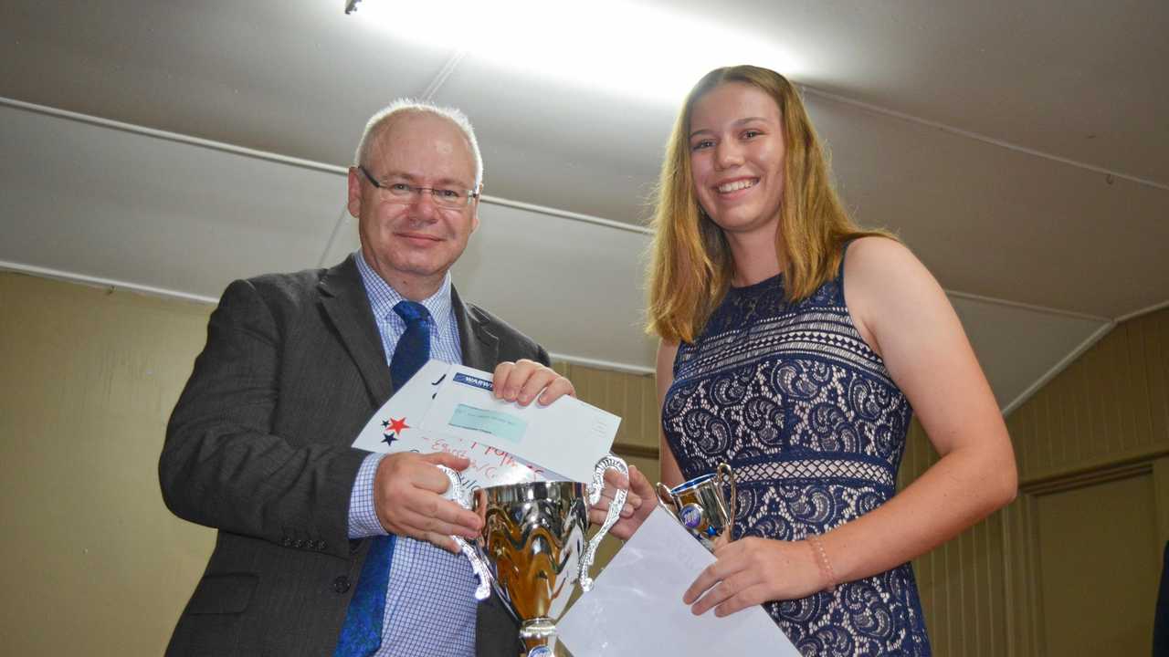 Warwick Credit Union CEO Lewis von Stieglitz and overall junior winner Kira Holmes at the awards at Hawker Rd Function Centre. Picture: Jiordan Tolli