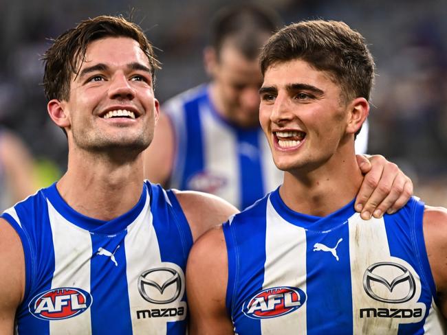 PERTH, AUSTRALIA - JUNE 08: Jy Simpkin and Harry Sheezel of the Kangaroos are happy with the win during the 2024 AFL Round 12 match between the West Coast Eagles and the North Melbourne Kangaroos at Optus Stadium on June 08, 2024 in Perth, Australia. (Photo by Daniel Carson/AFL Photos via Getty Images)