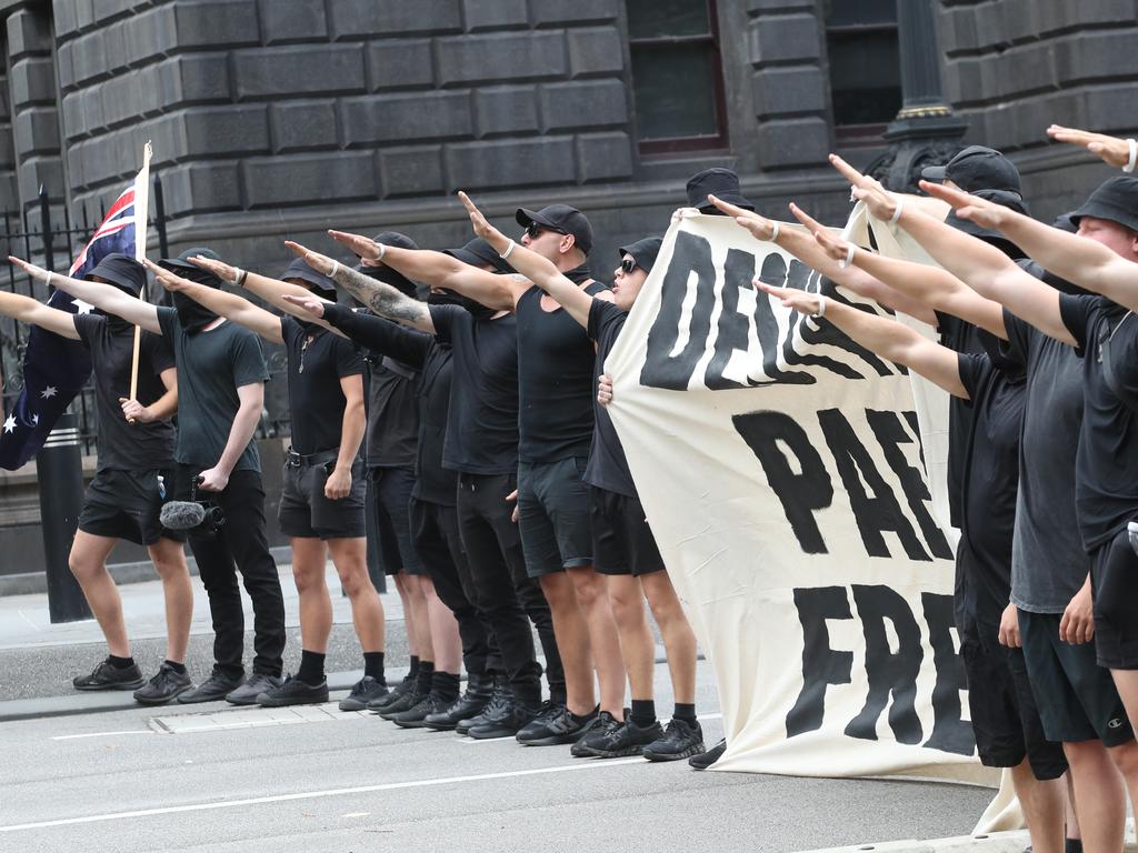 Neo-Nazi group storms pro, anti-transgender protest in Melbourne's CBD | Herald Sun