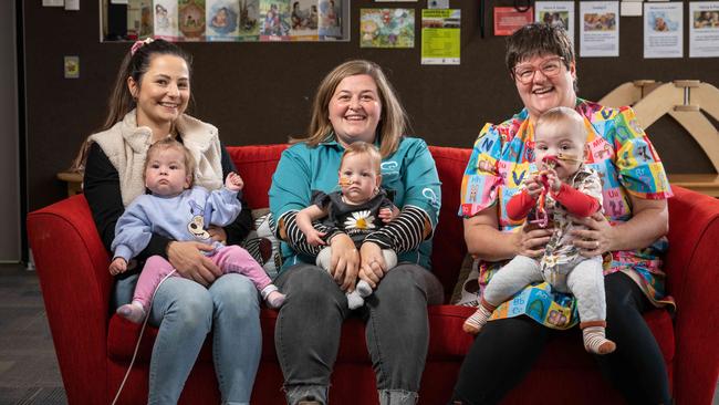 Danni Menzies with daughter Evelyn, centre, has organised a premature baby play group for other mums including Emily Burke and daughter Phoebe and Simantha Nation with son Atticus. Picture: Brad Fleet