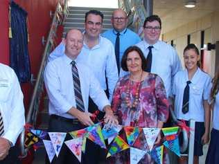 Opening a new block of classrooms at Carlisle Adventist Christian College are, back from left, Member for Whitsunday Jason Costigan, Rob Ellison, Member for Dawson George Christensen and (front from left) principal Andrew North, Northern Australian Conference president Pastor Darren Slade, Member for Mackay Julieanne Gilbert and students Tashia MacRae and Angie North.