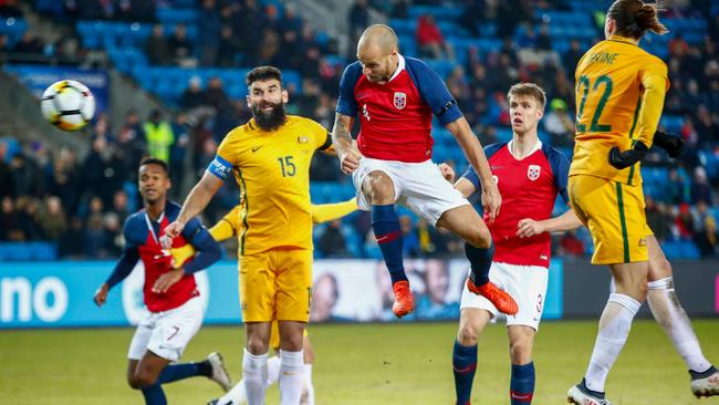 Mile Jedinak couldn’t stop Tore Reginiussen scoring Norway’s second.