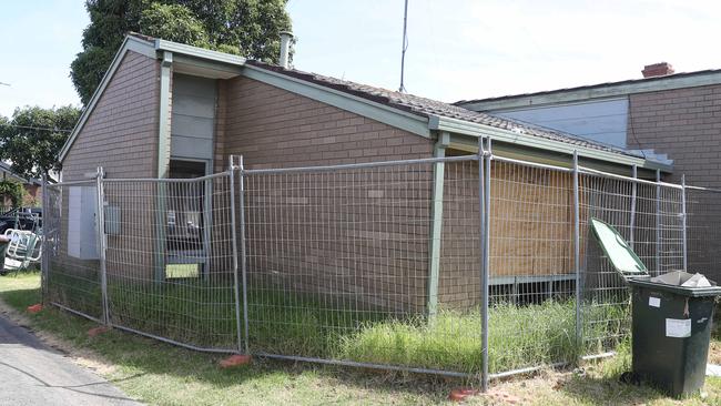 Fencing still blocks the Russell Street unit more than a year after the discovery. Picture: Alan Barber