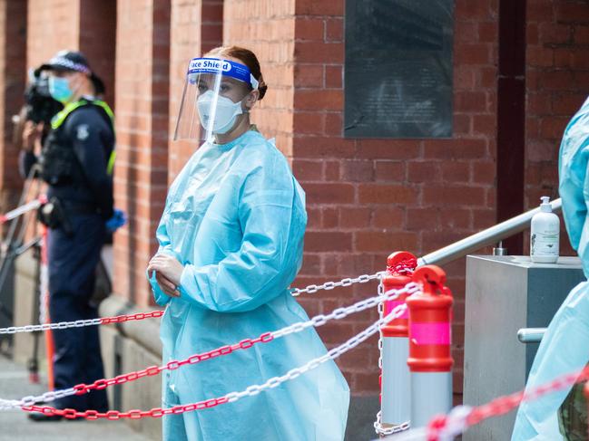 Hotel quarantine workers in PPE at the Intercontinental Hotel in Melbourne. Picture: Getty Images