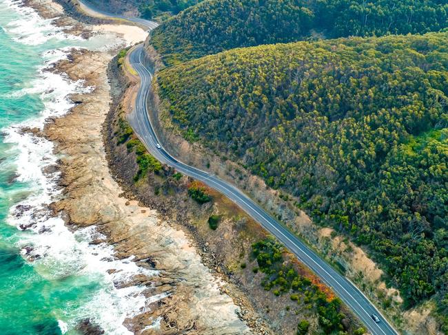 ESCAPE, CHEAT SHEET, GREAT OCEAN ROADPICTURE: ISTOCKCars driving on Great Ocean Road, Victoria, Australia  - aerial view