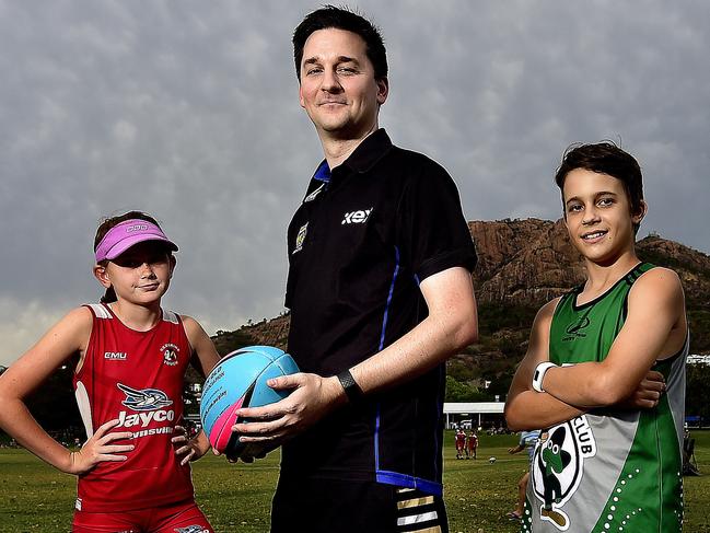 Kerrod Hall is president of the Townsville Junior Touch Football Association, pictured with Tia Crowley, 13 and Ethan Stout, 13. PICTURE: MATT TAYLOR.