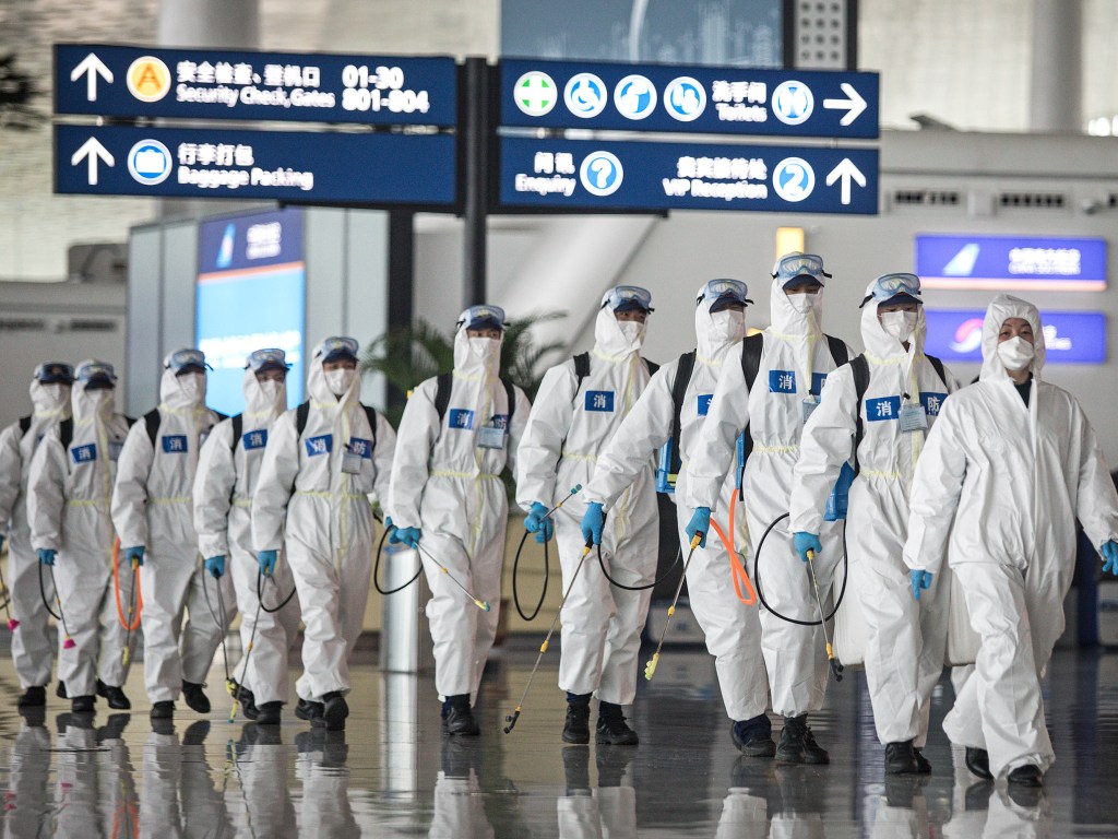 WUHAN, CHINA - APRIL 03: （CHINA OUT）Firefighters prepare to conduct disinfection at the Wuhan Tianhe International Airport on April 3, 2020 in Wuhan, Hubei Province, China. Wuhan, the Chinese city hardest hit by the novel coronavirus outbreak, conducted a disinfection on the local airport as operations will soon resume on April 8 when the city lifts its travel restrictions. (Photo by Getty Images)